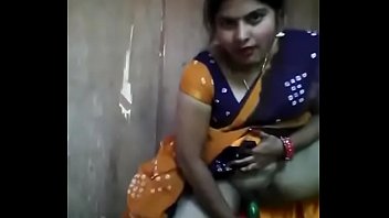 indian aunty inserting cucumber in cooch