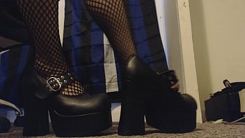 punk chick showcases off her fresh platform high-heeled slippers
