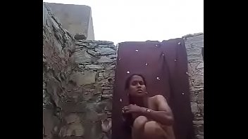 village dame out door bathing selfie