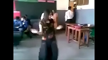 pakistani female dance in front of studs in classroom