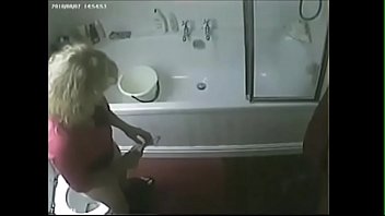 covert webcam caught my mega-bitch mommy tugging in wc